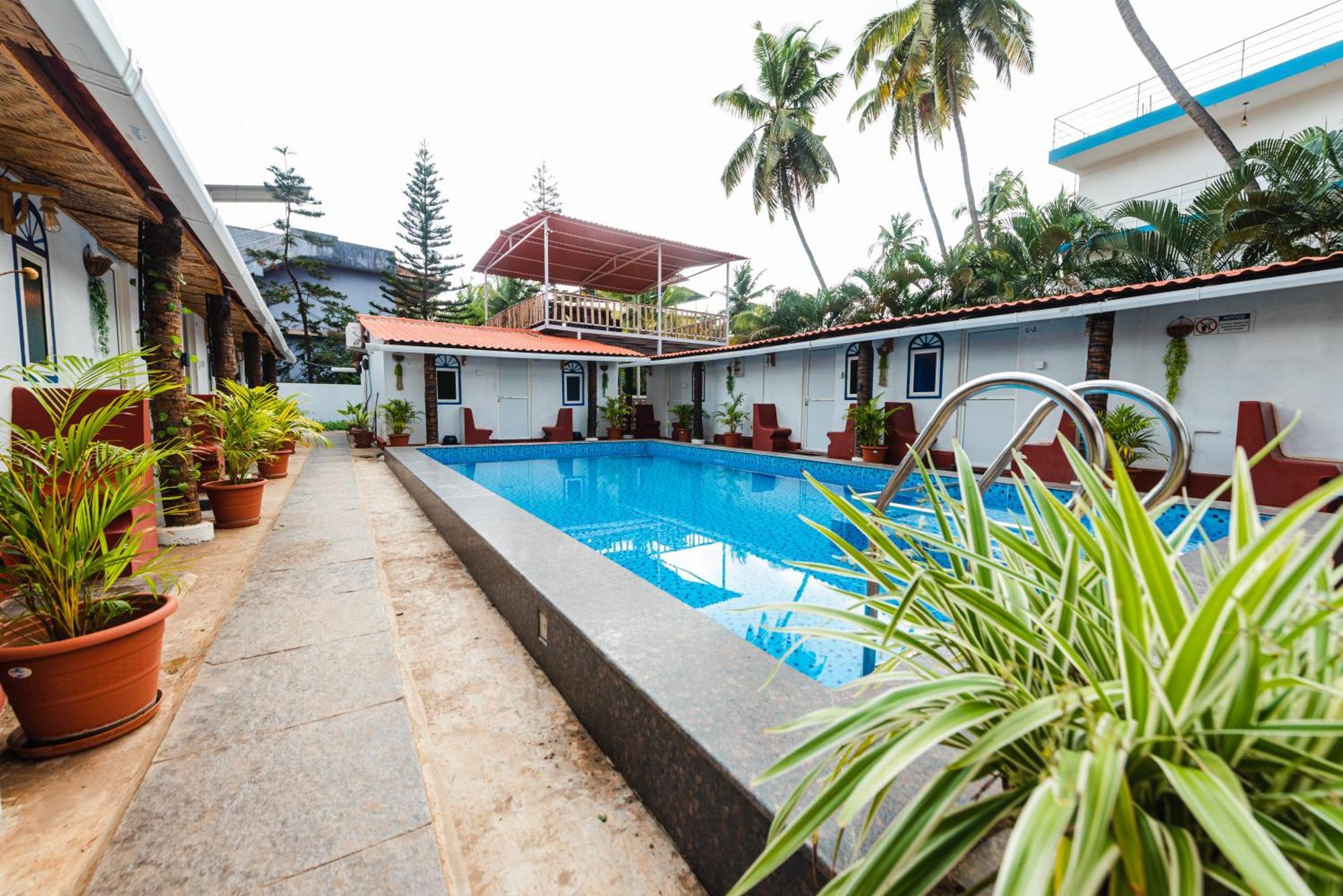 Hotel La Paulo'S Near Beach Resort Morjim Buitenkant foto